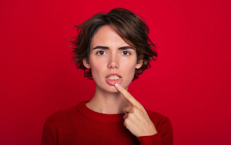 a woman with gum disease